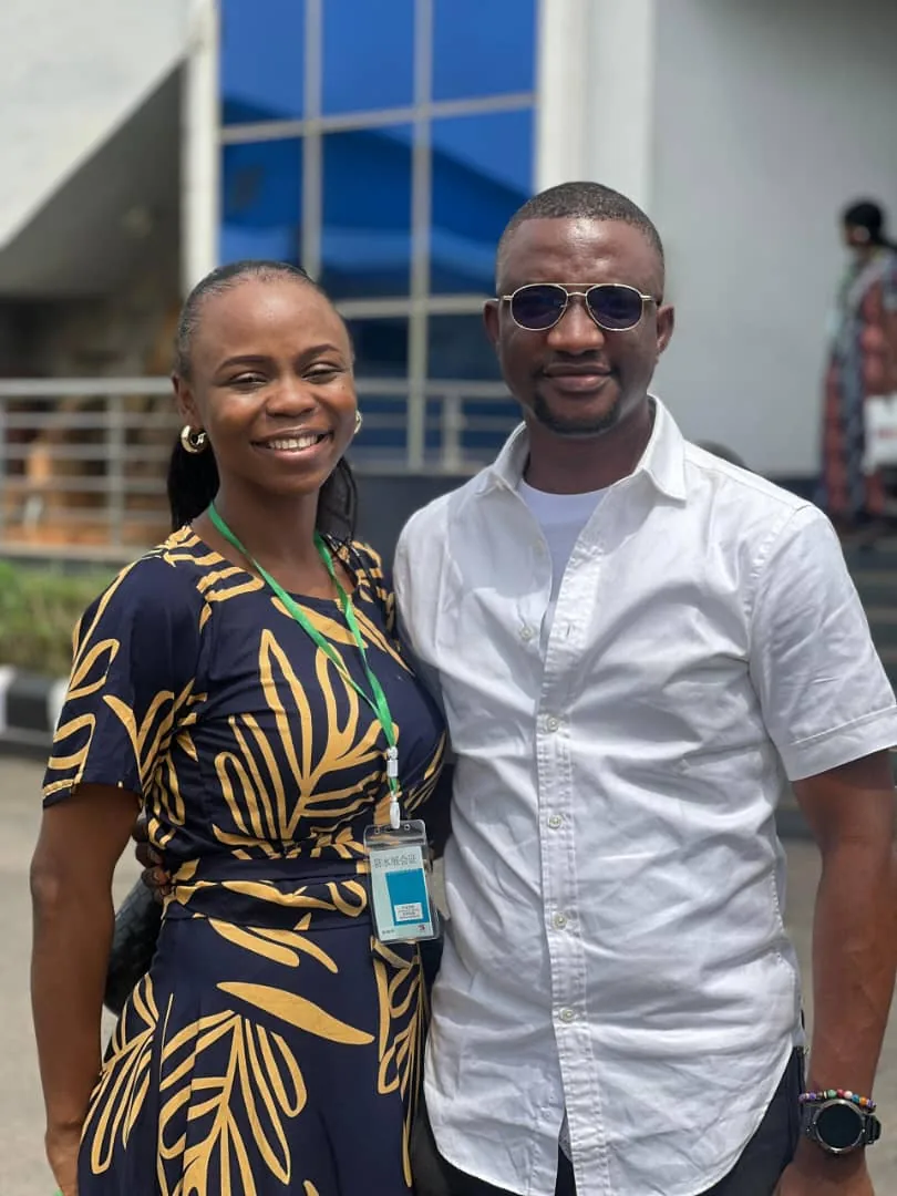 A husband and wife smiling together at the retreat