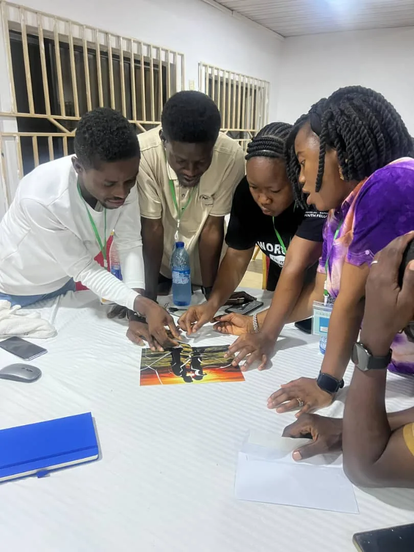 Couples working on a game together at the retreat